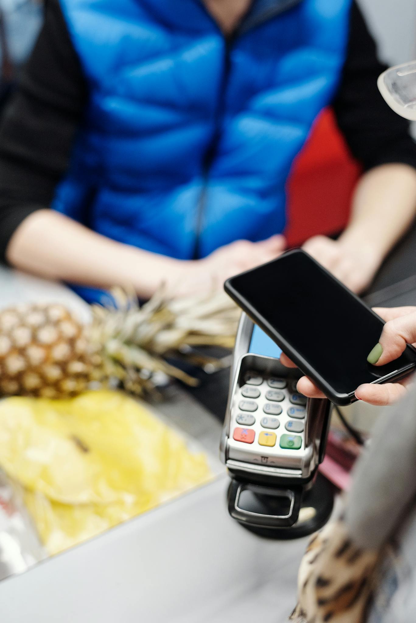 a customer uses a smartphone for contactless
