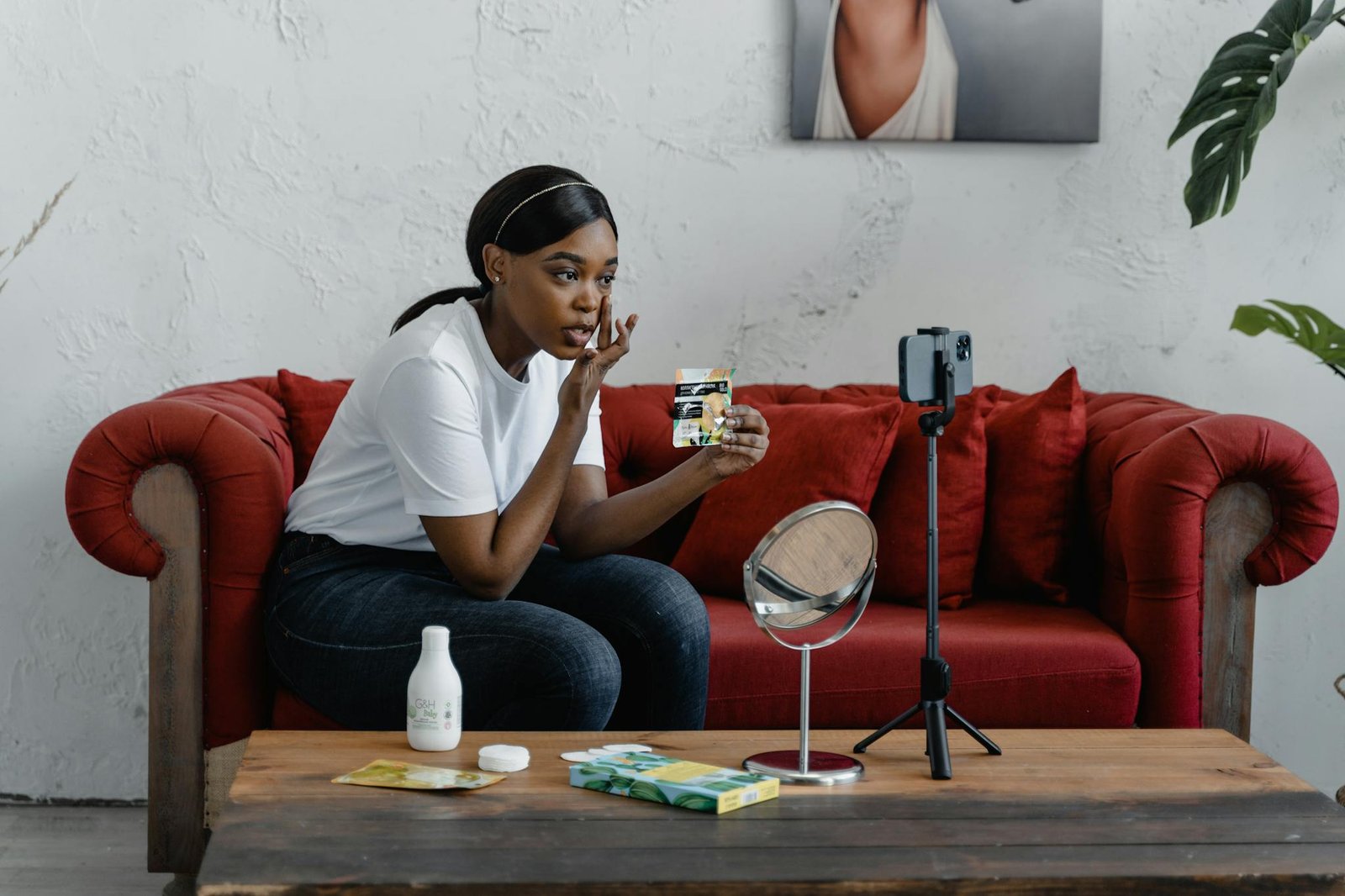 a woman records a makeup tutorial in